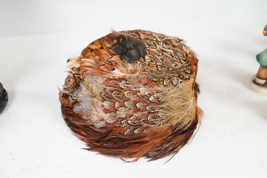 A decorative ladies feather hat